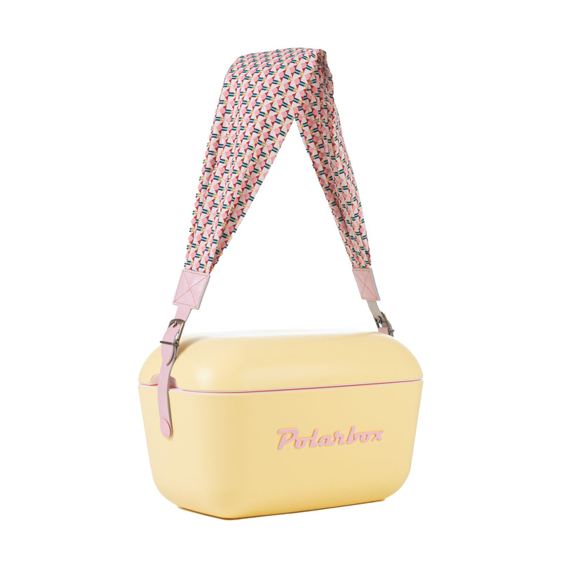 A pink geometric patterned strap that can be easily switched on and off a 20L & 12L cooler box by Polarbox.